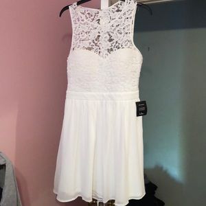 White lace dress with open back